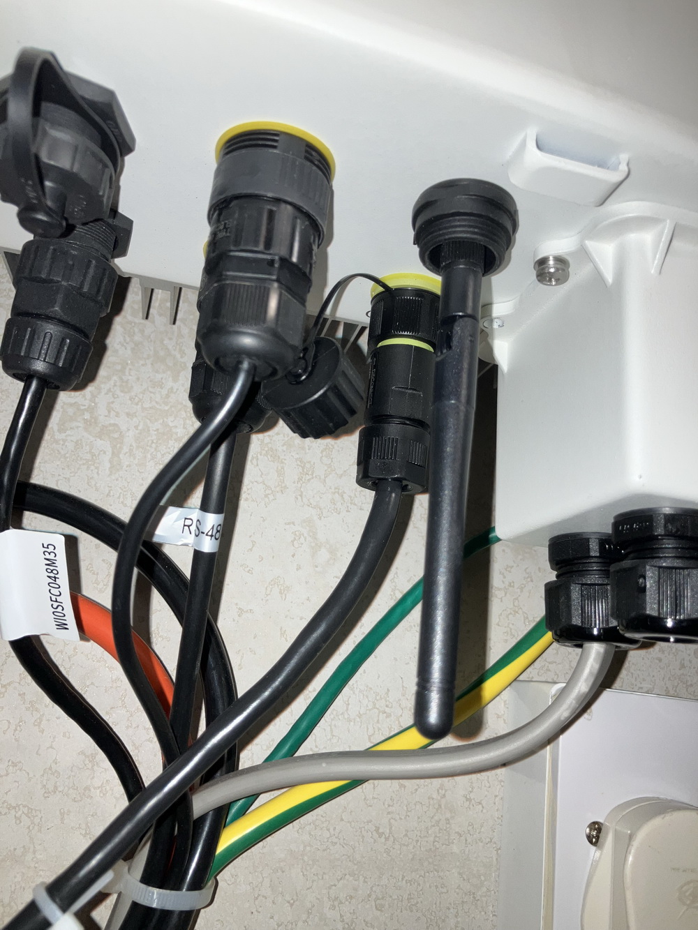 Cables connected to the underside of the Solis inverter